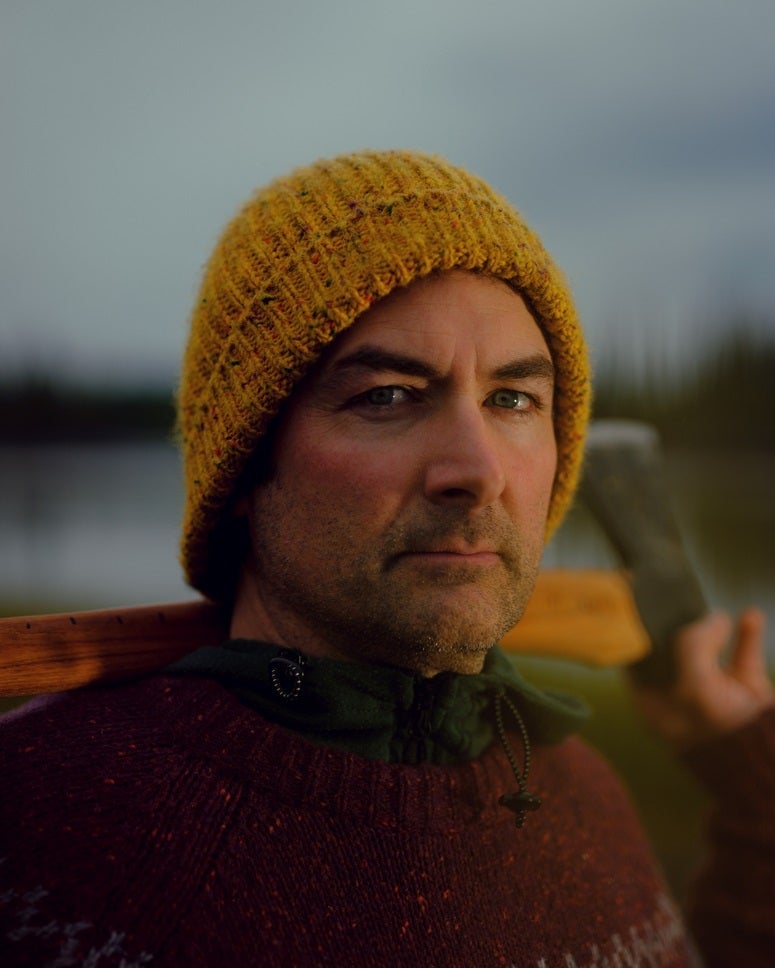 'Alone' Season 11 cast member Dub Haetz wearing a yellow knit hat