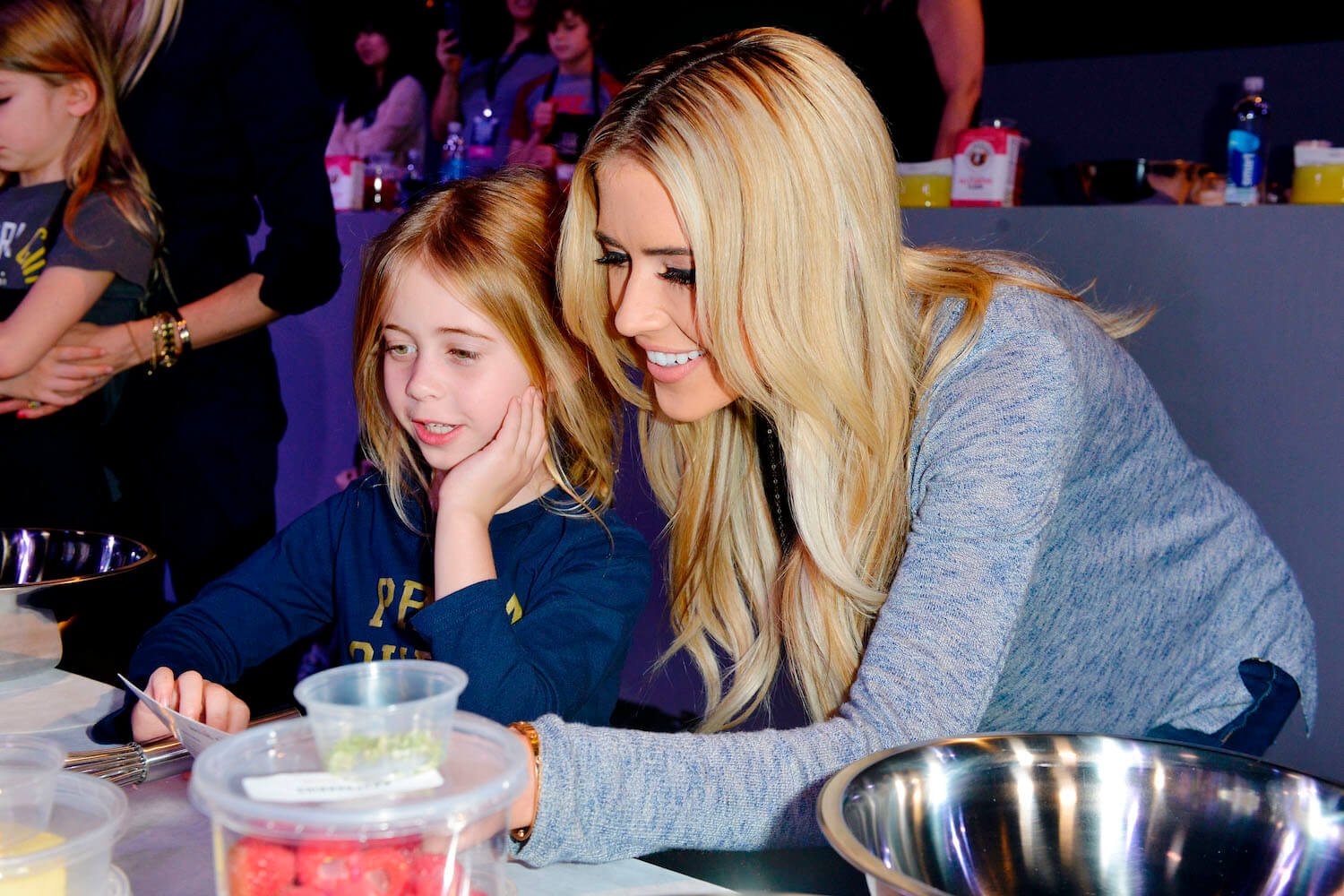 'Christina on the Coast' star Christina Hall with her daughter, Taylor, doing a craft