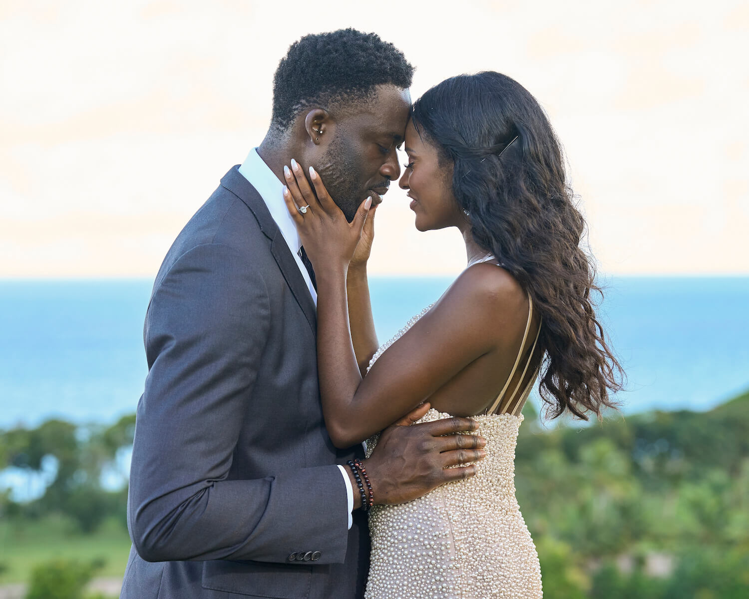 'The Bachelorette' 2023 stars Dotun Olubeko and Charity Lawson face to face during their engagement in Fiji. Dotun and Charity are now discussing wedding plans.