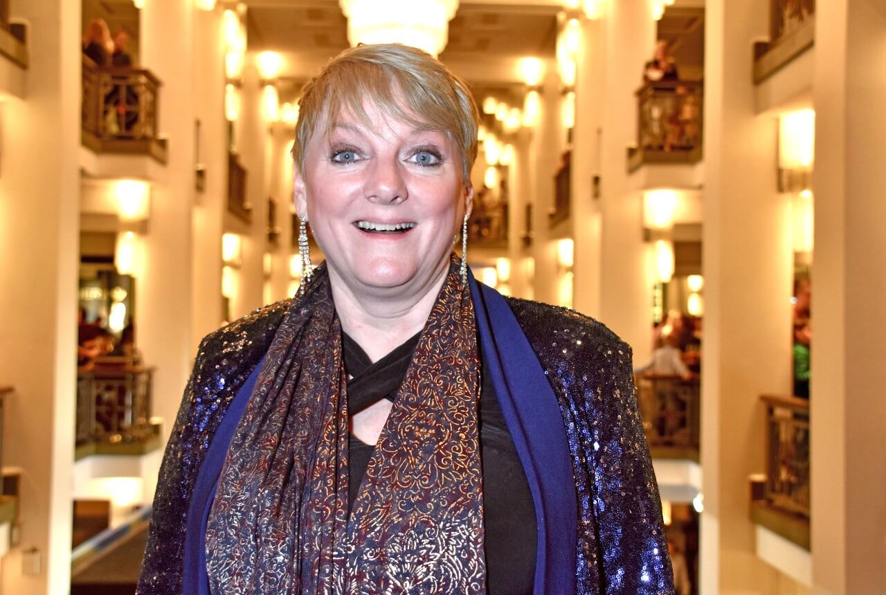 Little House on the Prairie Alison Arngrim smiles while attending an event.