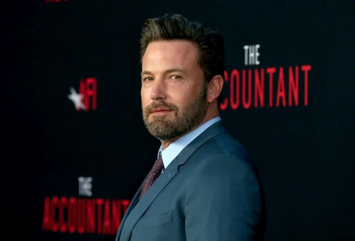 Ben Affleck wears a suit at the premiere of 'The Accountant.'