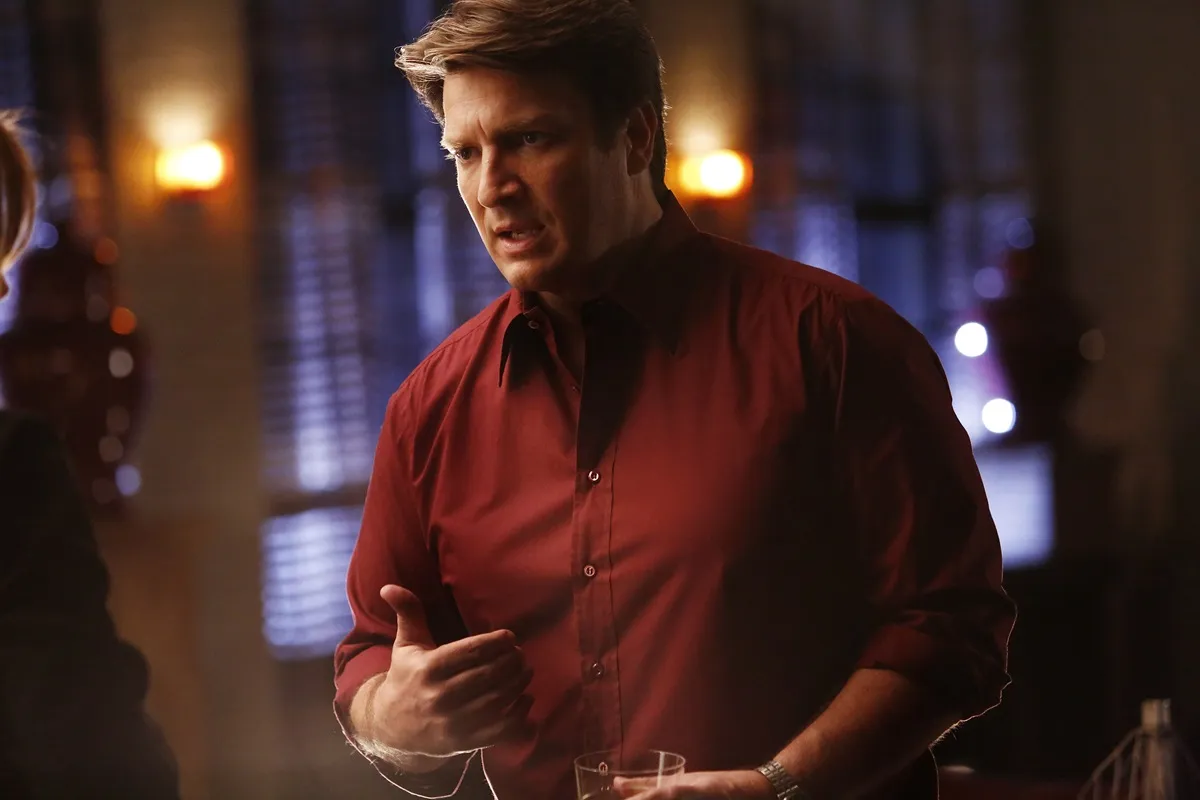 Nathan Fillion posing as his 'Castle' character Richard Castle.