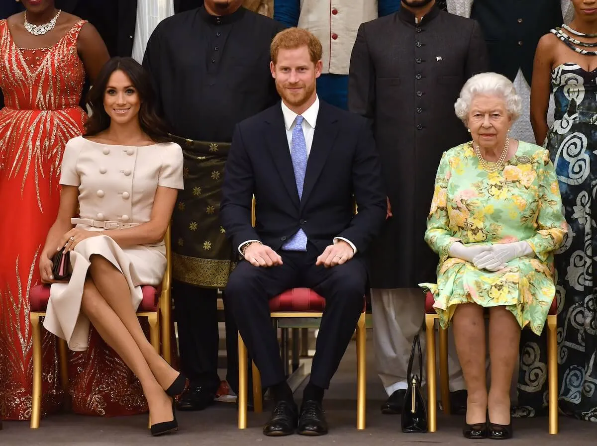 Prince Harry and Meghan Markle with Queen Elizabeth II in 2018